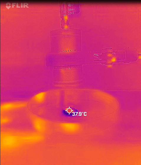 Thermal infrared image of a lab experiment reading 37.9 degrees Celsius